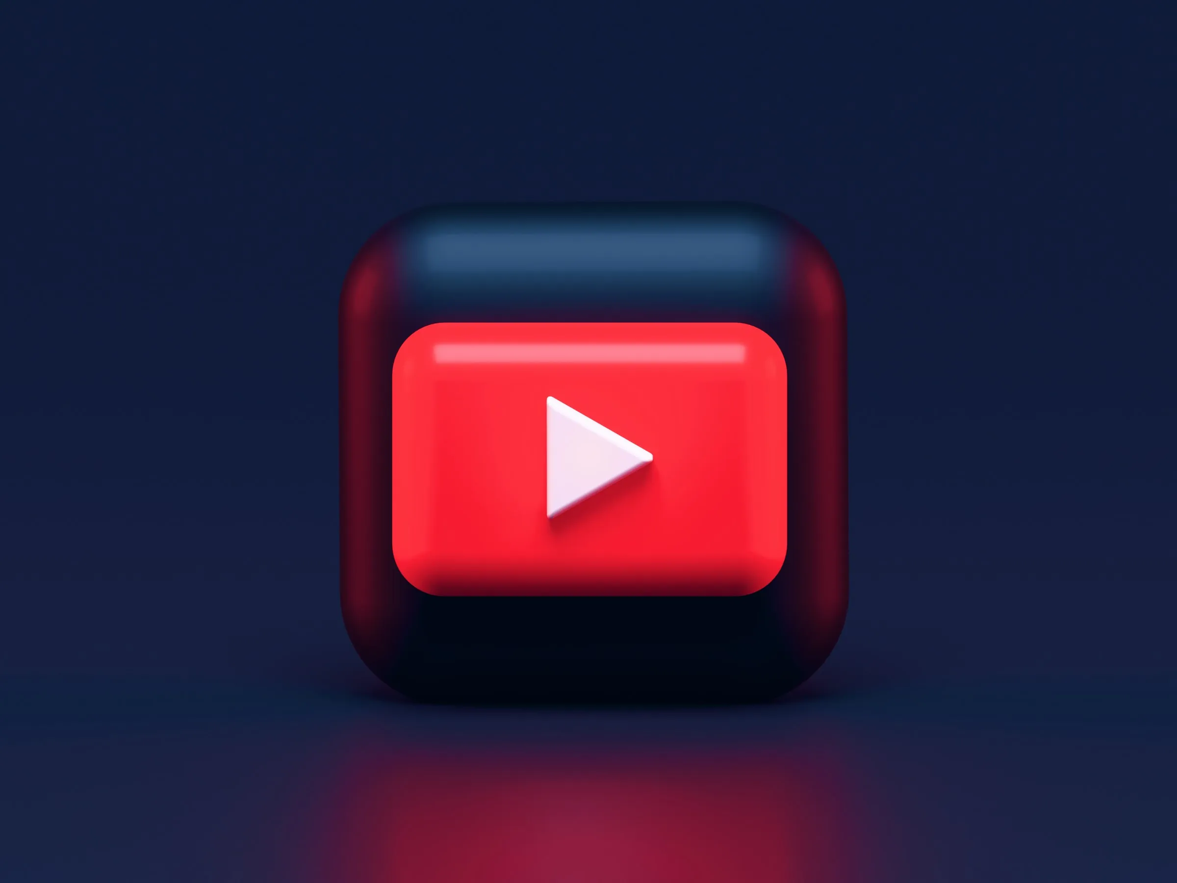 An image that has a YouTube logo in the middle of it